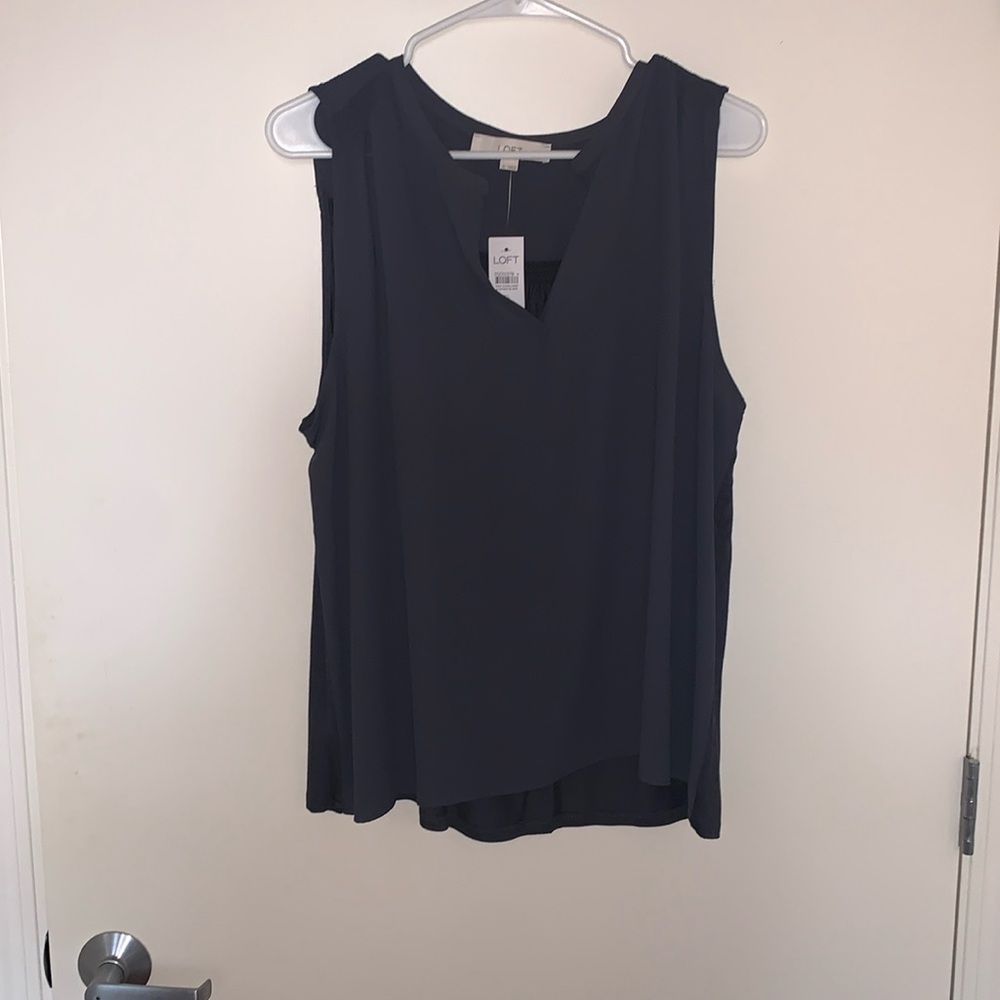 LOFT Woman’s gray blouse.